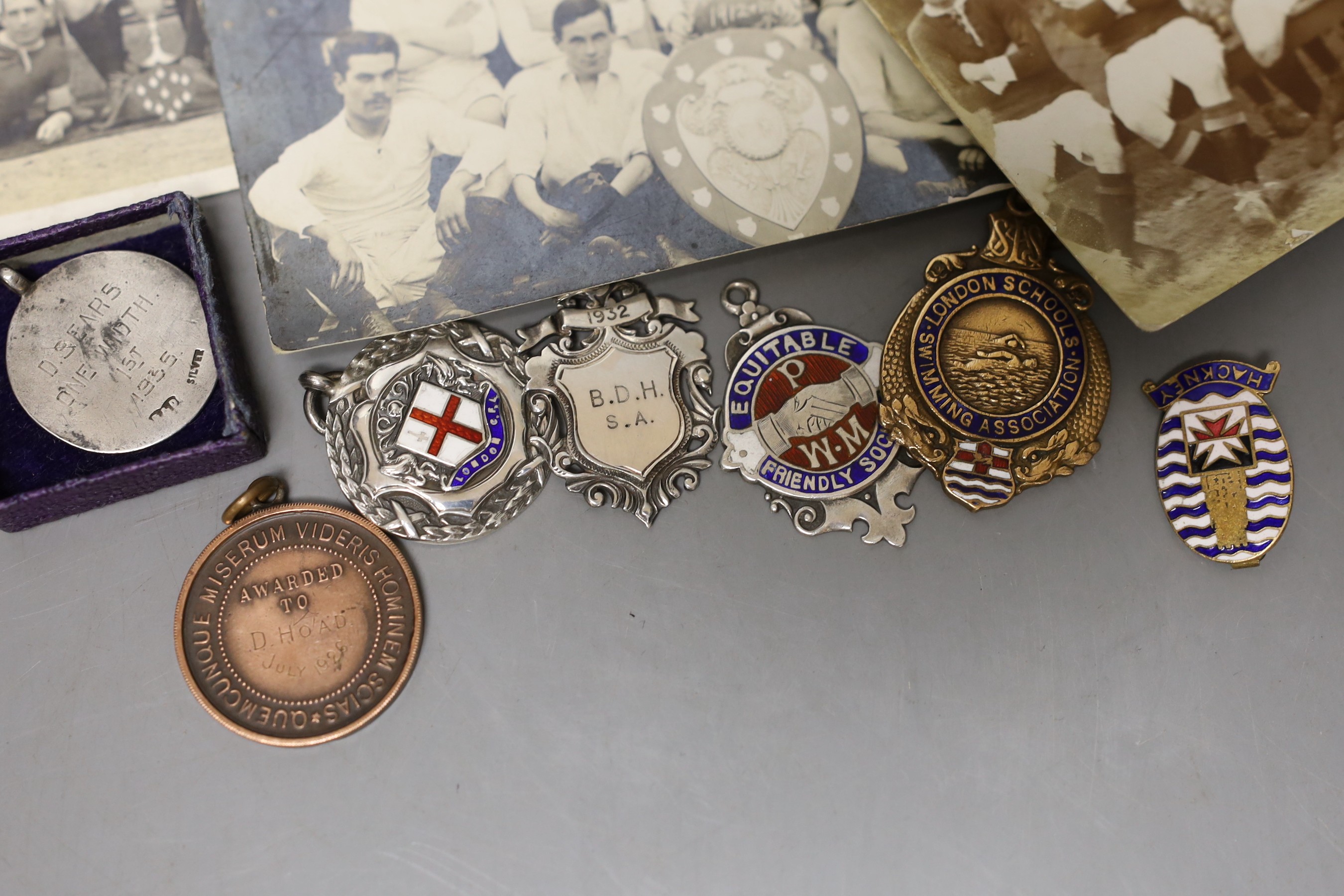 Assorted pre war football medals including silver.